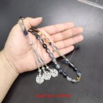 ⁦מסבחה זוהרת בחושך – 33 חרוזי רזין בגווני כחול ושמנת⁩ – תמונה ⁦6⁩